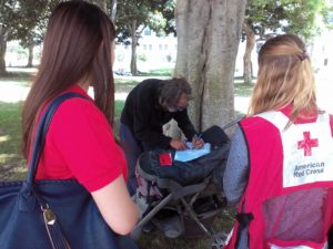 Red Cross client writes a letter to his sister, which will be delivered through the Cuban Red Cross.